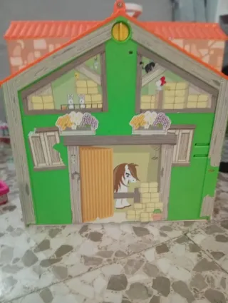 Casa de campo y animales de juguete
