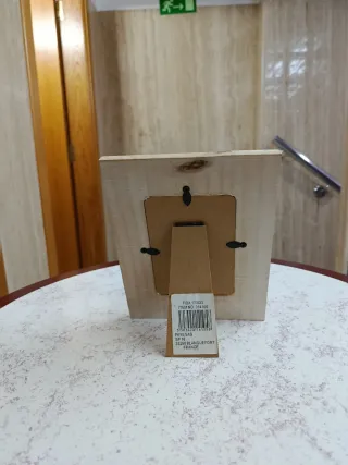 Portafoto in legno con conchiglie