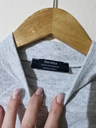 Jersey gris cuello alto manga larga