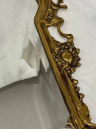 Espejo de Bronce Dorado con Marco Ornamentado