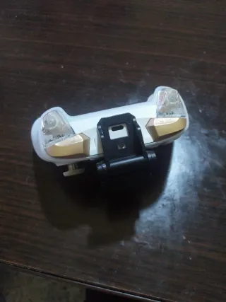 Mando Gamesir con soporte para móvil