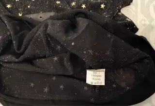 Body negro estrellas doradas manga corta