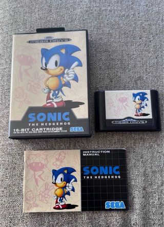 SEGA Mega Drive + 2 mandos + Manual + 4 juegos