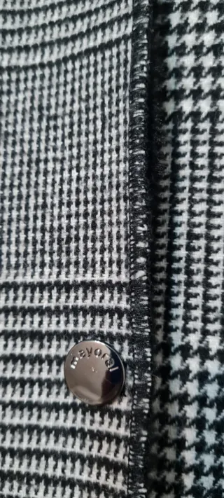 Giubbotto invernale ragazza plaid con cappuccio.