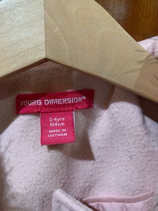 Trenca rosa con capucha y pelo