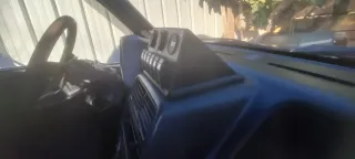 Consola Suzuki Vitara con interruptores y tomas