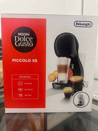 Cafetera Dolce Gusto DeLonghi blanco.