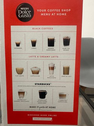 Cafetera Dolce Gusto DeLonghi blanco.