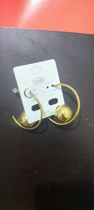 Orecchini CAIS in acciaio dorato