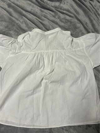 Blusa blanca con botones