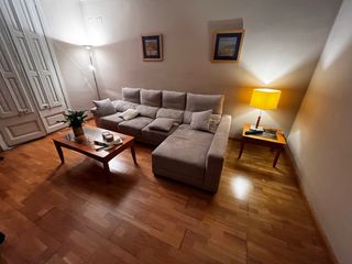 Divano in L grigio con chaise longue