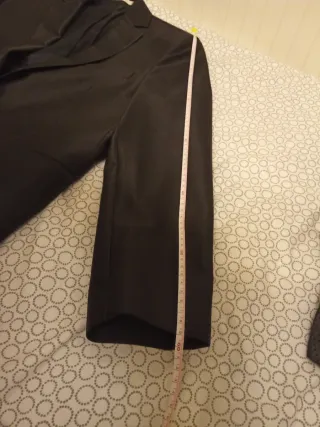 Dos trajes, uno Emidio Tucci