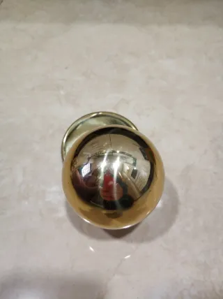 Pomo de puerta blindada dorado