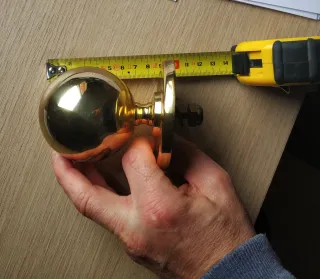 Pomo de puerta blindada dorado