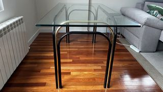 Mesa de comedor cristal y metal dorado