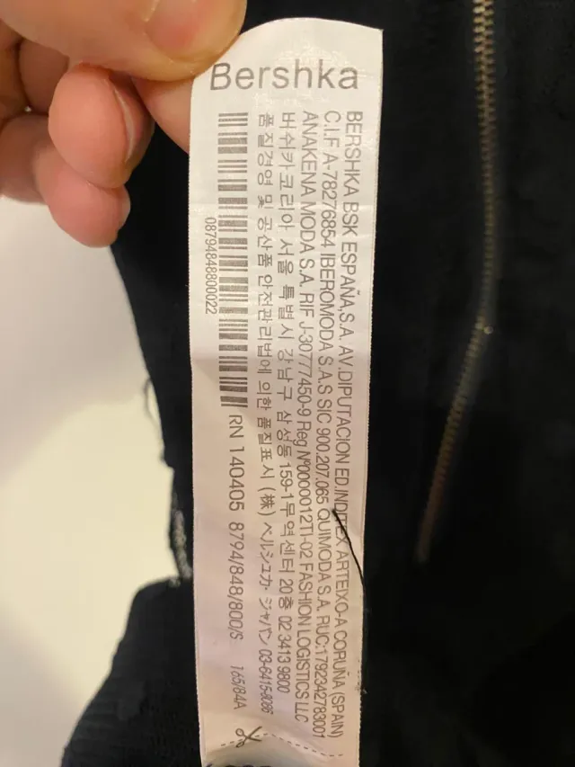 Vestido negro corto con lunares