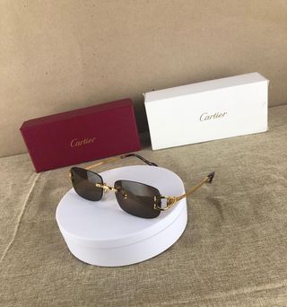 Gafas Cartier Signature C | Doradas y Marrones