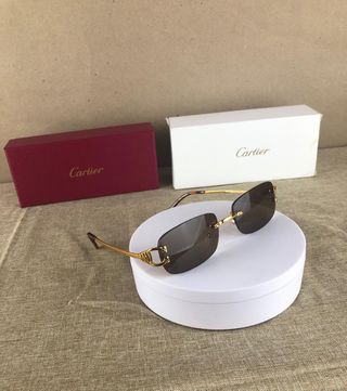 Gafas Cartier Signature C | Doradas y Marrones