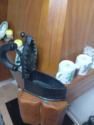 Plancha antigua de hierro fundido