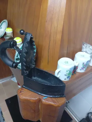 Plancha antigua de hierro fundido