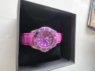 Reloj marca Marea Morado y Plateado