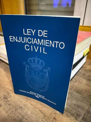 Colección de cuatro libros de leyes españolas.