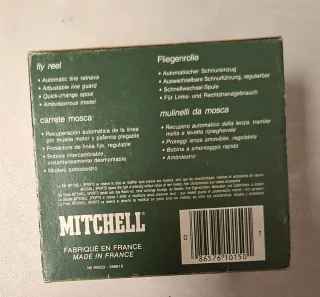 Carrete Mitchell 710 Automatico -  Con moscas