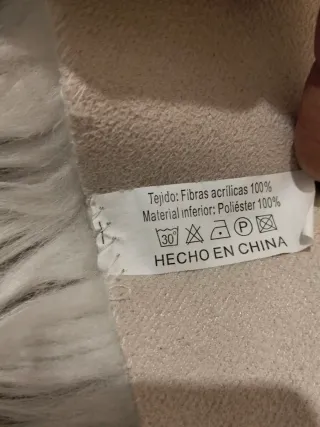 Alfombra redonda de lana blanca