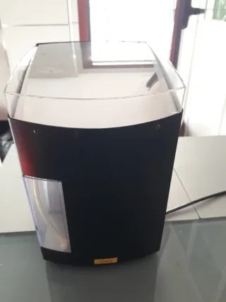 Cafetera de cápsulas blandas con vaporizador