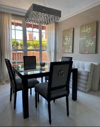 Mesa Comedor con sillas Roche Bobois