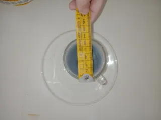 Candela in tazzina da caffè in vetro