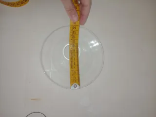 Candela in tazzina da caffè in vetro