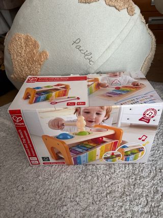 Banco de madera musical Hape para bebés nuevo