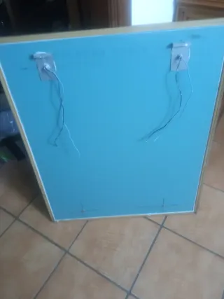 Espejo de baño dorado y transparente