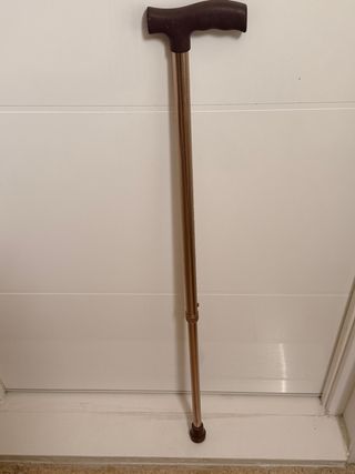 Bastón ajustable metal y plástico