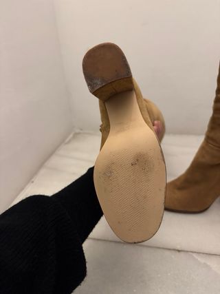 Botas altas ante Zara