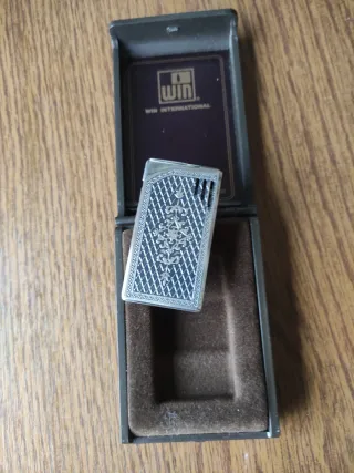 Mechero antiguo WIN International