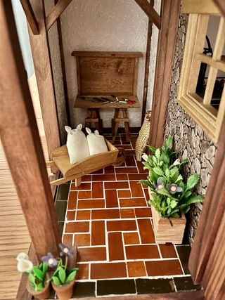 Casa de muñecas rústica