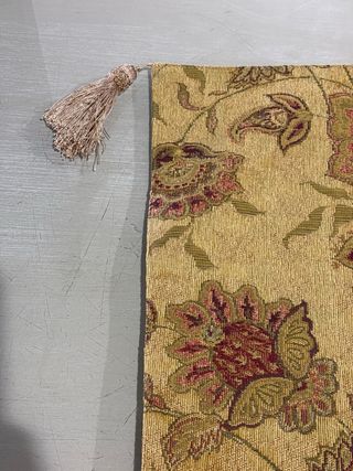 Tapete decorativo con borlones