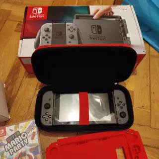 Nintendo Switch + Juegos Mario party y Oddyseey