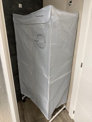 Tendedero con funda y calefactor