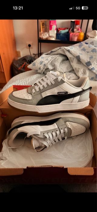 Zapatillas Puma grises y blancas