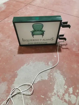 Cartel y banderola Izquierdo y Alanís