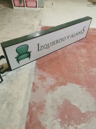 Cartel y banderola Izquierdo y Alanís