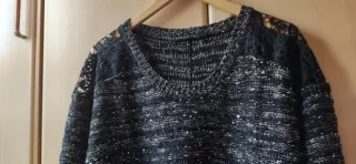 Jersey negro con brillos dorados