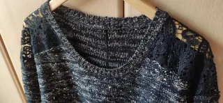 Jersey negro con brillos dorados