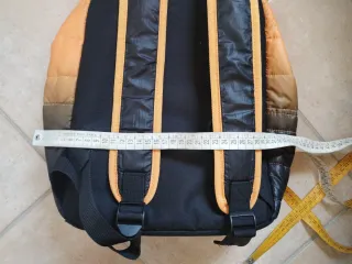 Zaino imbottito arancione e nero