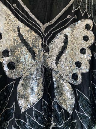 Blusa lentejuelas mariposa negra y plata