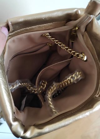 Bolso dorado multi posición nuevo 29x37x1