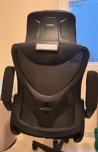 Silla ergonómica de oficina negra. Amazon
